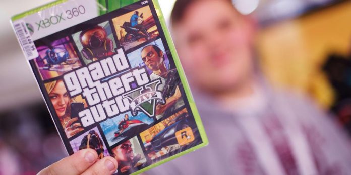 Taylor Pelling of Sutton poses with his copy of the console game