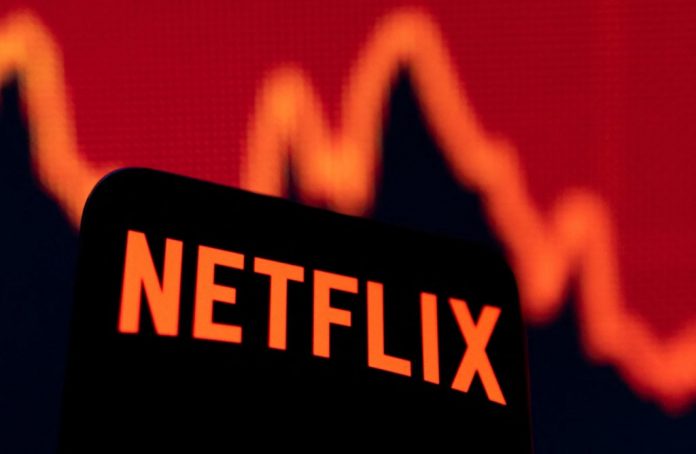 Illustration shows Netflix logo and stock graph
